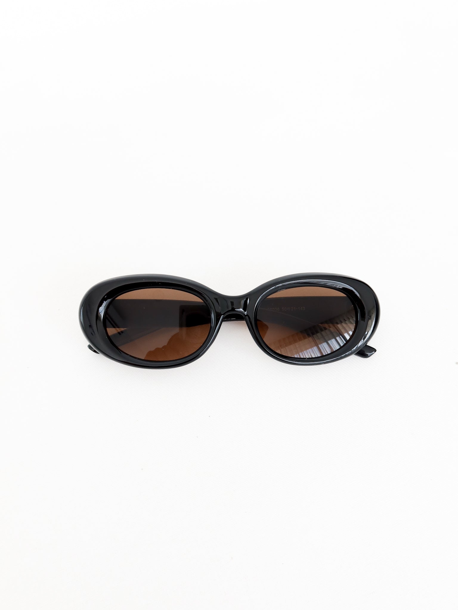 Gafas de sol ovaladas lentes cafe