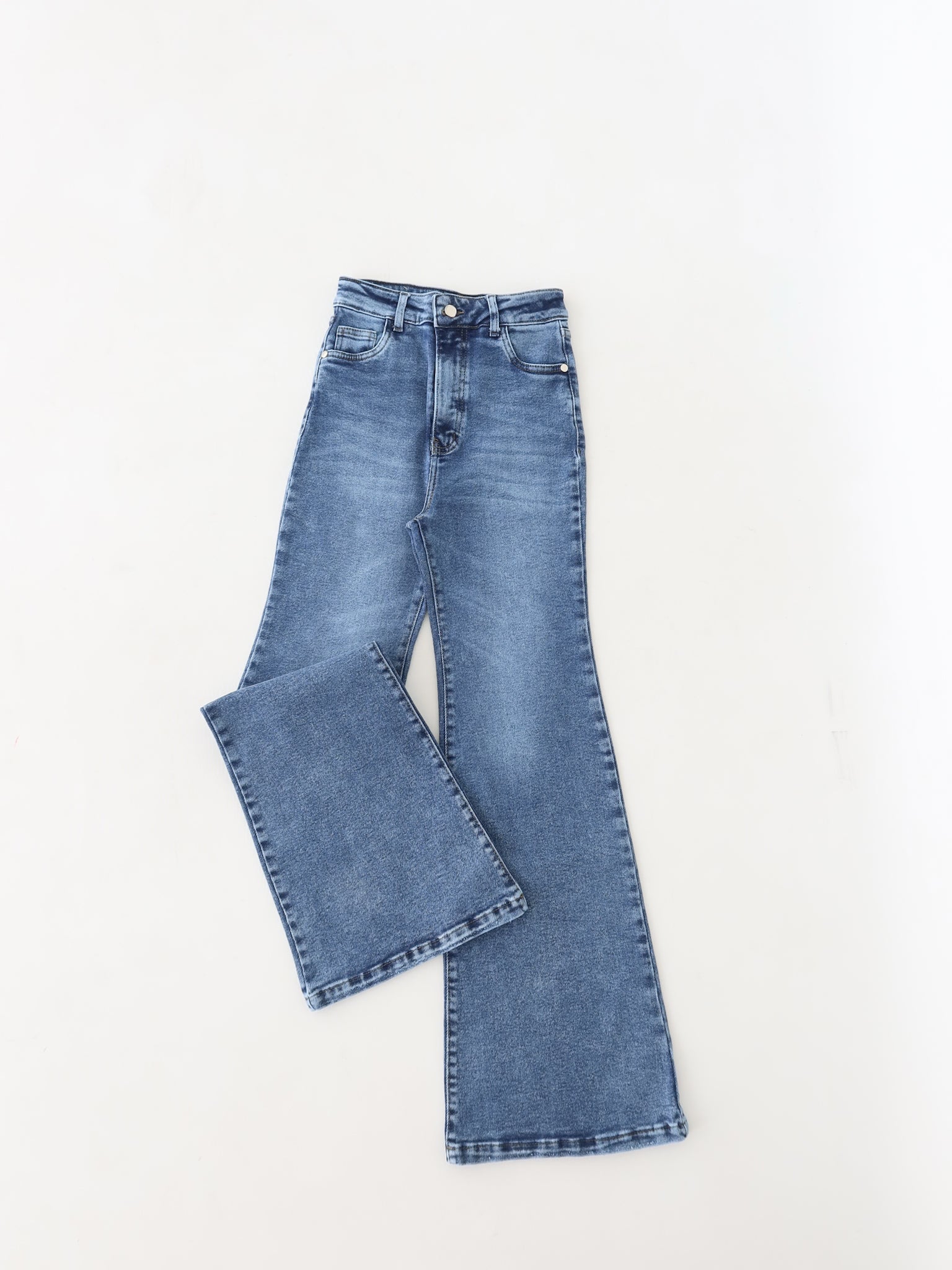 Flare regular jeans azul jaspeado