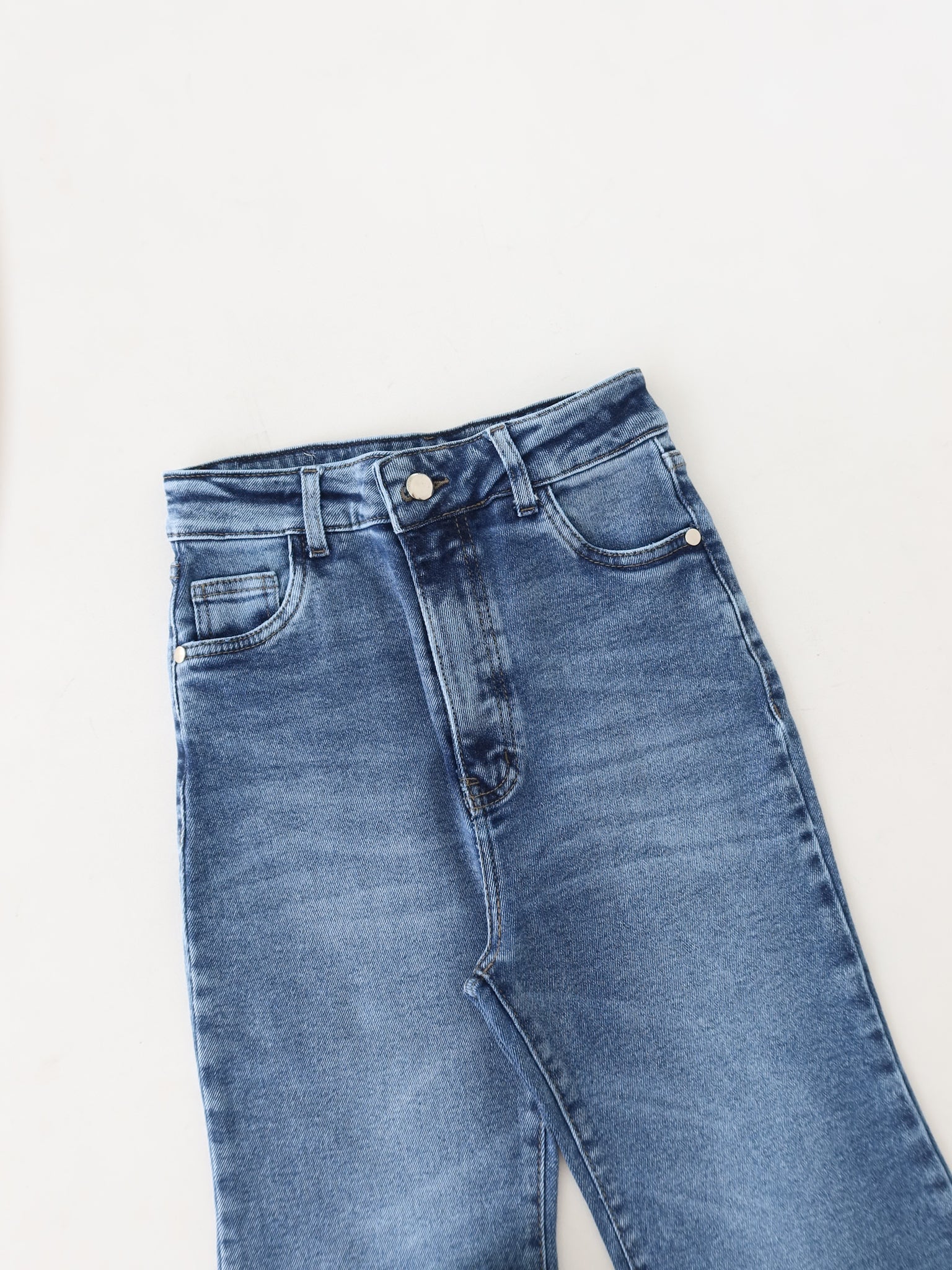 Flare regular jeans azul jaspeado